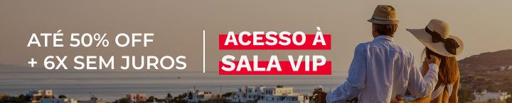 casal passeando e mirando a paisagem, com a descrição na imagem da promoção vigente. Seguro Viagem por até 50% de desconto e parcelamento até 6x sem juros, com benefícios de cobertura em mais de 190 países, seguro para bolsas e mochilas e atendimento por whatsapp 24 horas